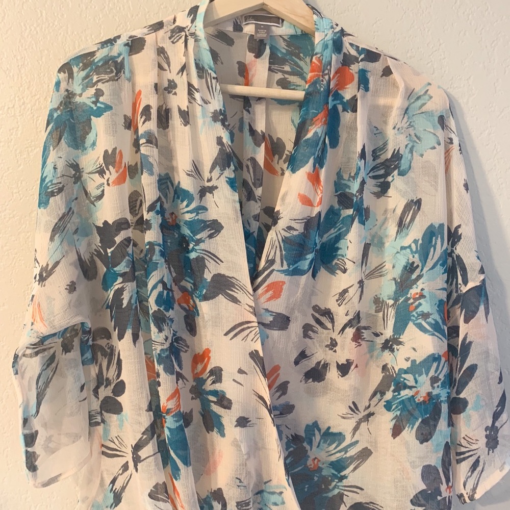 Sheer pale pink and blue floral blouse